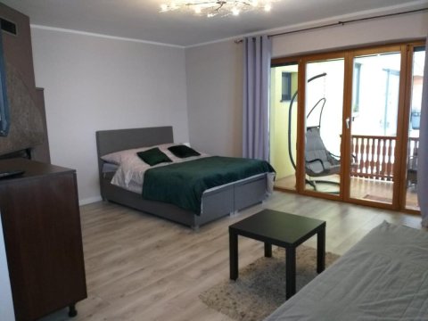Domek pod świerkami