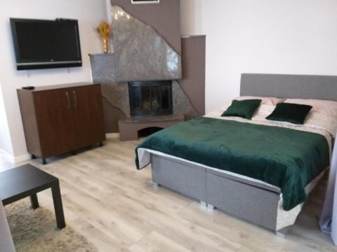Domek pod świerkami