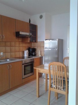 Kuchnia z pełnym wyposażeniem w dwupokojowym - apartament wakacyjny