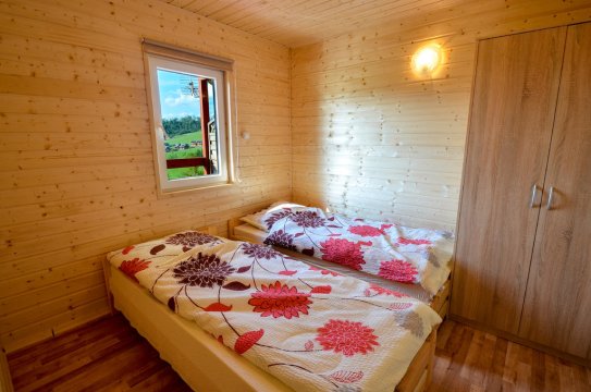 sypialnia domek - Domki i pokoje z łazienkami Bieszcady