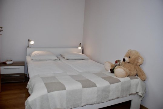 Łóżko - Apartament AMUR | idealny dla rodzin z dziećmi 