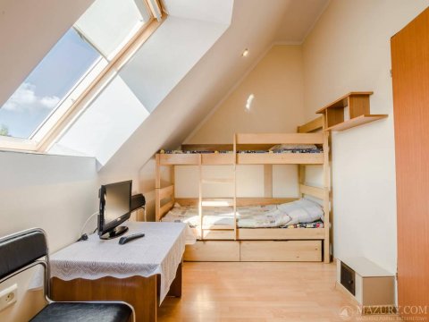 sypialnia z łóżkiem piętrowym - Agroturystyka Ranczo na Mazurach. Cisza i spokój z widokiem na jezioro Omulew