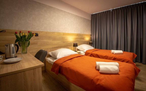 Pokój dwuosobowy PREMIUM - Jubilat - noclegi, zakład przyrodoleczniczy, nowocześnie urządzone pokoje.
