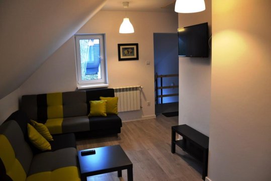 Przestronny apartament - Przy przystani i jeziorze.Apartament i pokoje z łazienkami_jacuzzi_ognisko_nurki