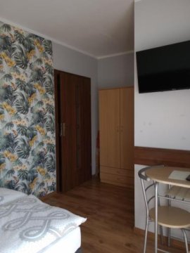 Pokoje, apartament i domek letniskowy 
