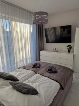 Przestronny M&M  Apartament 50m2 z 15m2 tarasem znajdujący się 50 m od morza.