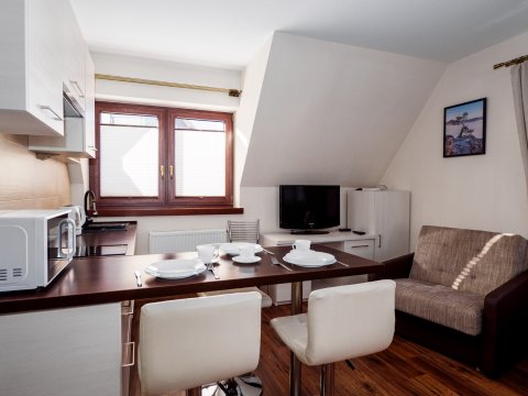 Apartamenty z widokiem na góry, blisko popularnych szlaków turystycznych.