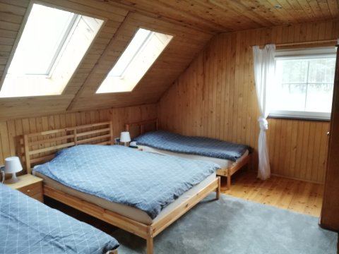 Domki całoroczne otoczone lasem 150 m od jeziora 
