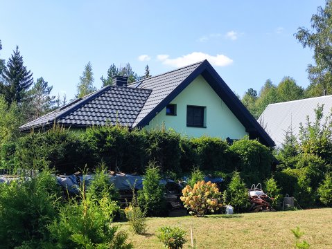 Domki całoroczne otoczone lasem 150 m od jeziora 