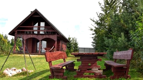 dom drewniany nad jeziorem, balia z jacuzzi, sauna, bilard