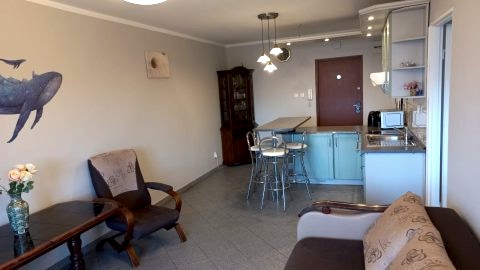 Apartament z widokiem na morze i latarnię morską
