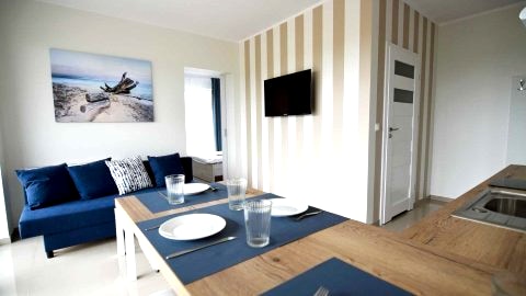 Komfortowy 2  pokojowy  apartament z kuchnią i łazienką blisko plaży na parterze