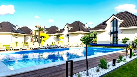 Family Resort Ustka - Domki dwupoziomowe z basenem