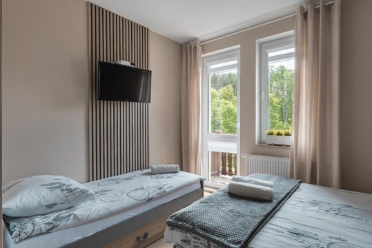 Pokoje Gościnne Szumny Lasek