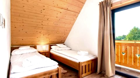 Domek drewniany z bali Asina Chata z sauną i kominkiem Zawoja