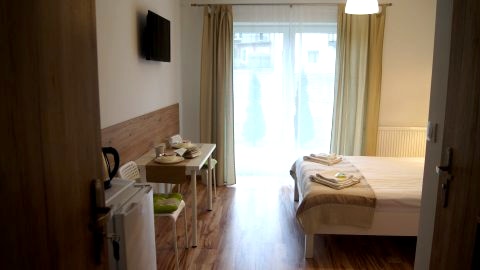 Pokój dwuosobowy na parterze z tarasem 11