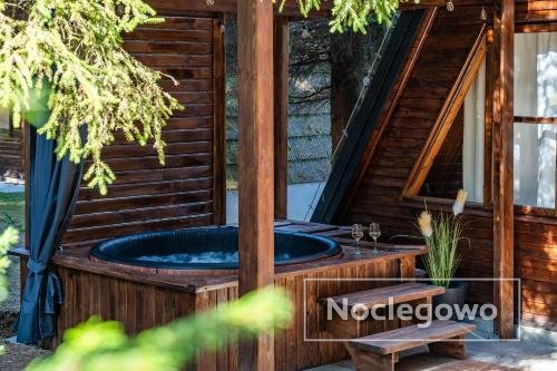 Leśna Sielanka domki z jacuzzi w lesie, góra Szczebel.Kort tenisowy,boiska,basen